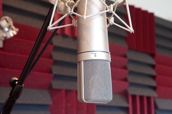 Silvered professional microphone in recording studio